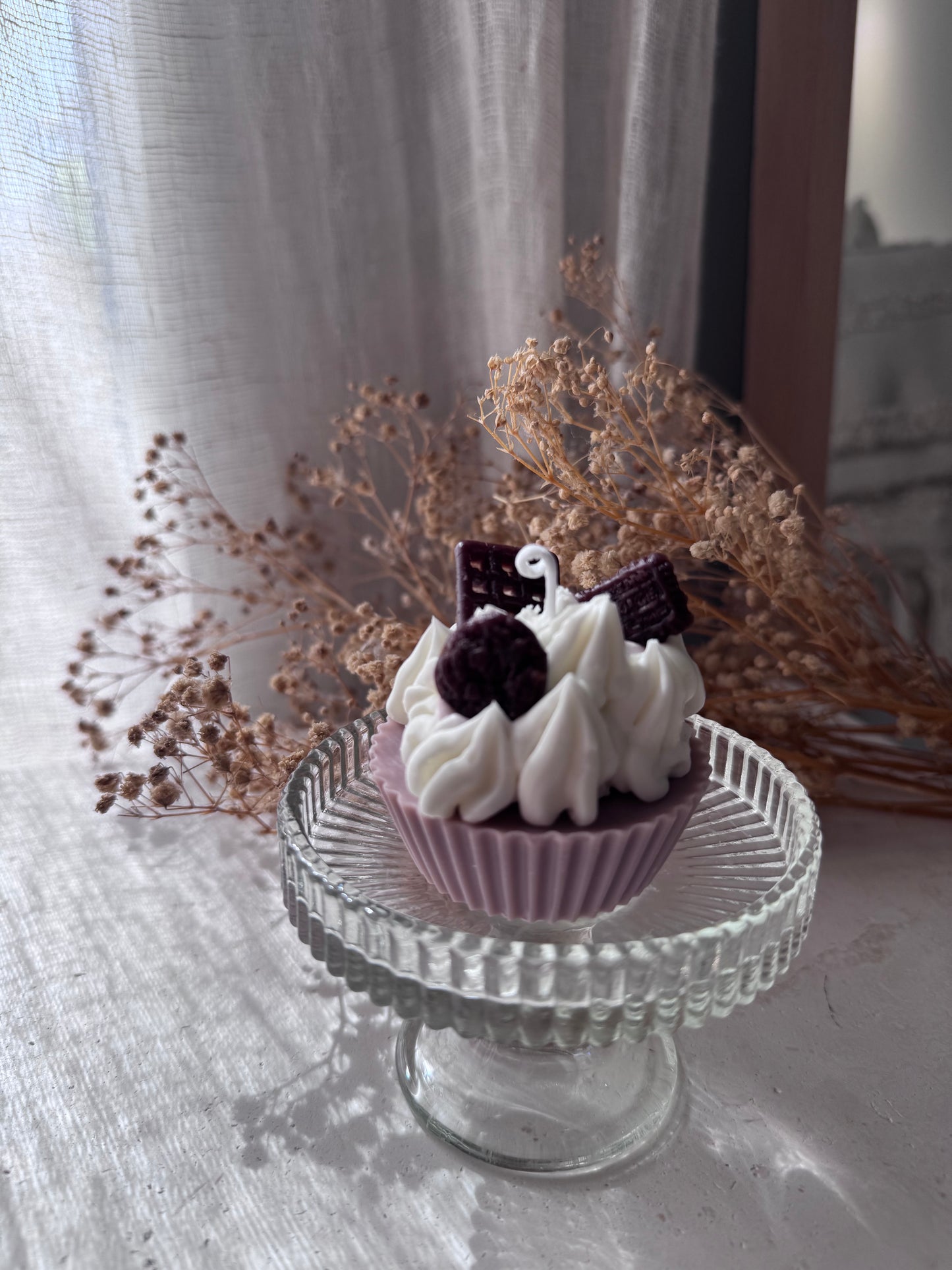 Figura de vela en forma de pastel