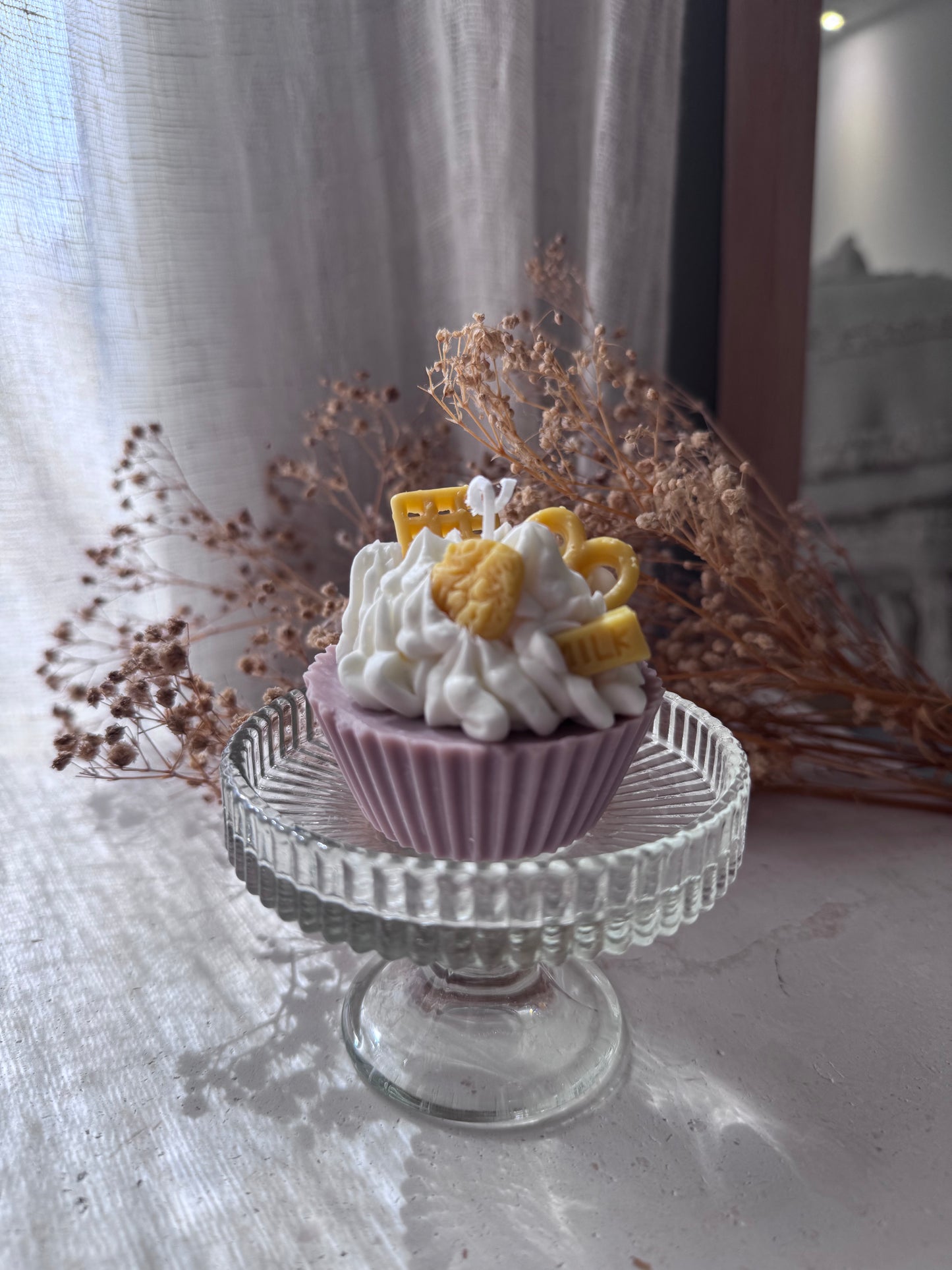 Figura de vela en forma de pastel